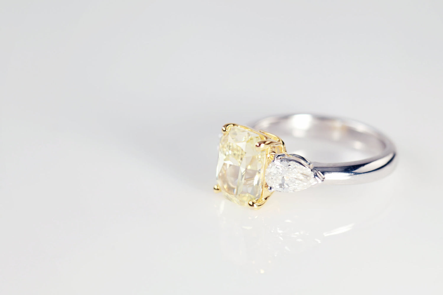 Emerald Cut Yellow Diamond With Pear Shaped Diamond Shoulders