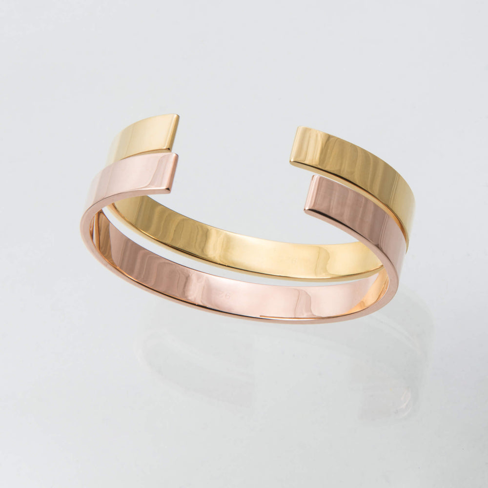 Sterling Silver and 18ct Rose Gold Torque Bangle