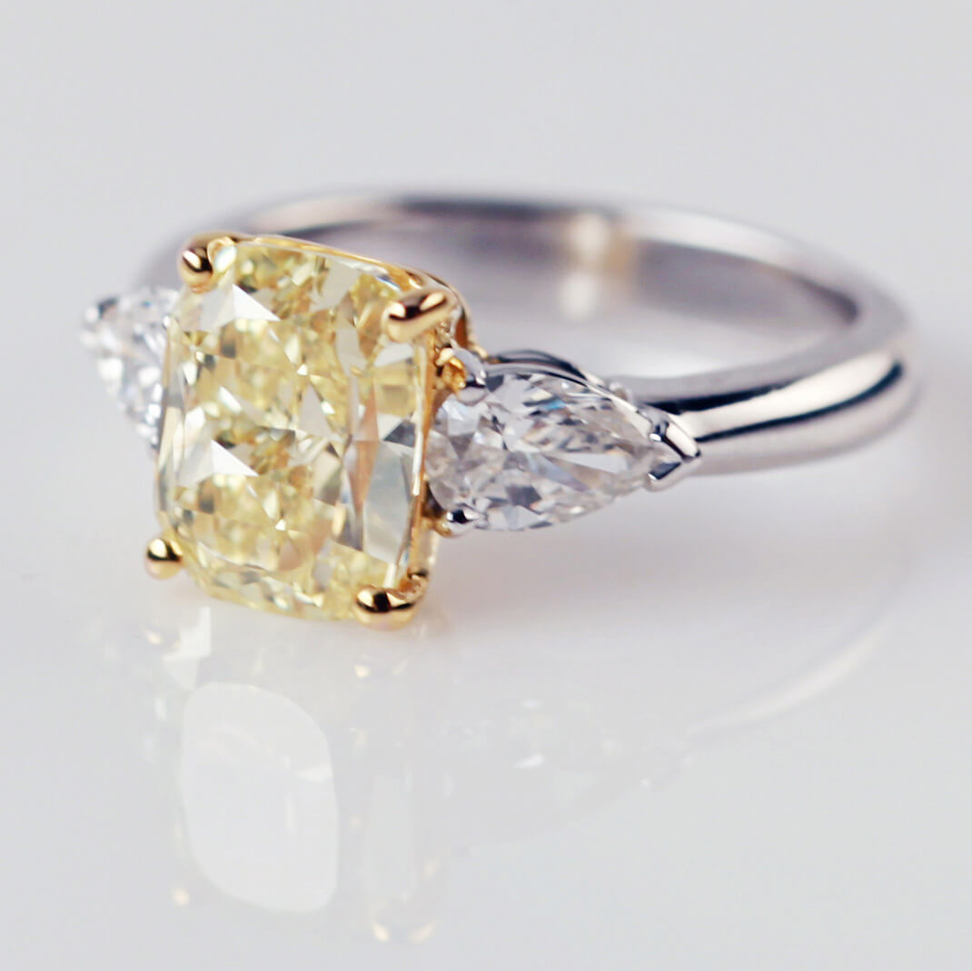 Emerald Cut Yellow Diamond With Pear Shaped Diamond Shoulders
