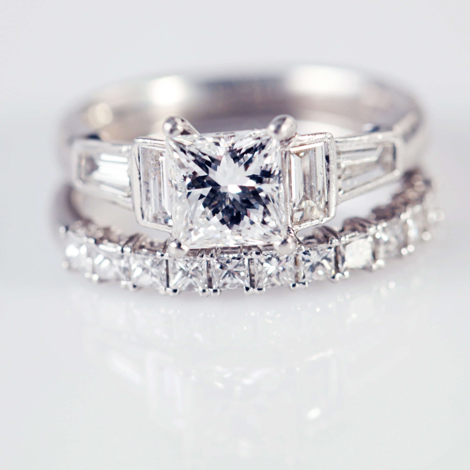 Princess Cut Diamond Ring With Baguette Diamond Shoulders