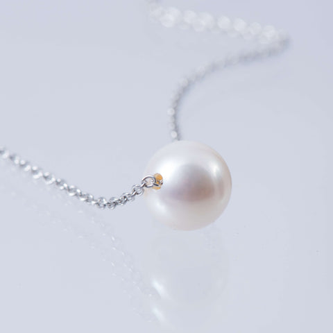 Floating Polo Ball Necklace