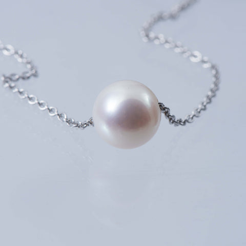 Floating Polo Ball Necklace