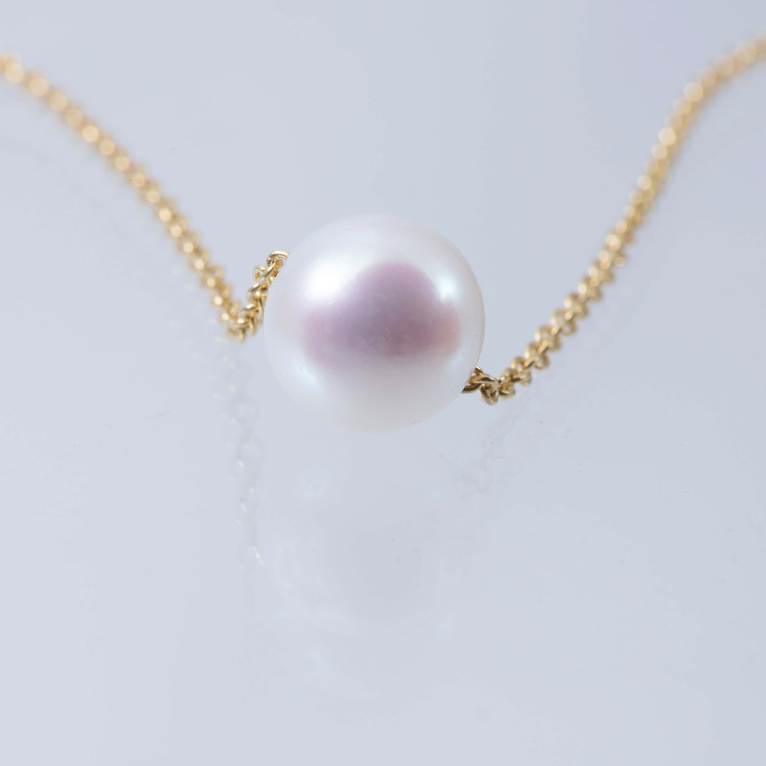 Floating Polo Ball Gold Necklace