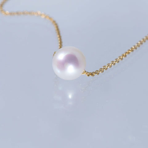 Floating Polo Ball Gold Necklace